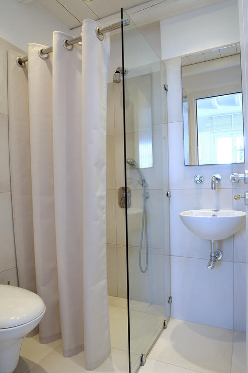 Kapetan Tasos Suites Pollonia Ruang foto